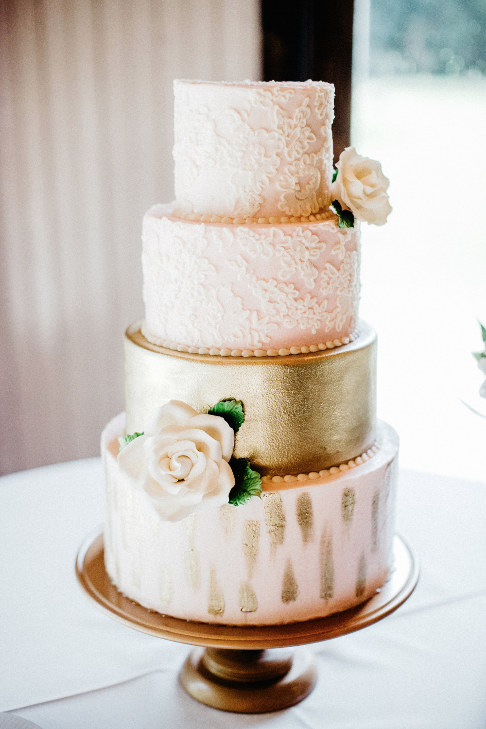 blush and gold wedding cake