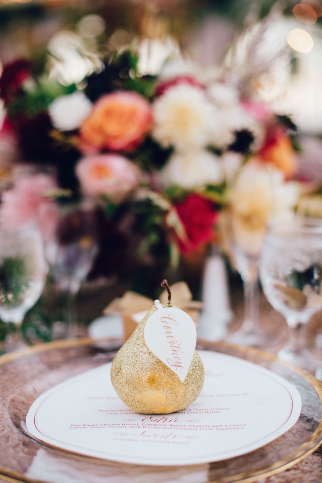 Golden pear place setting with floral arrangement centerpiece