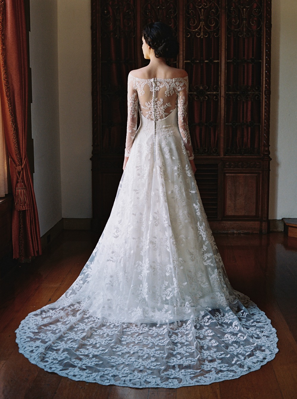 Lace back wedding dress with long train detail