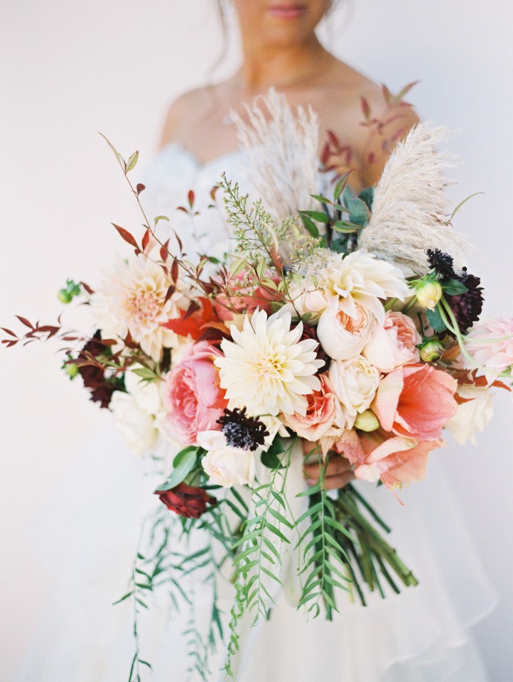 Elegant bridal bouquet with blush roses and pampas grass
