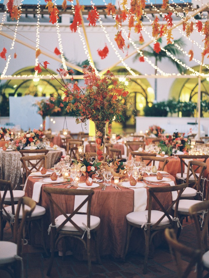 Elegant wedding reception with autumn themed table settings