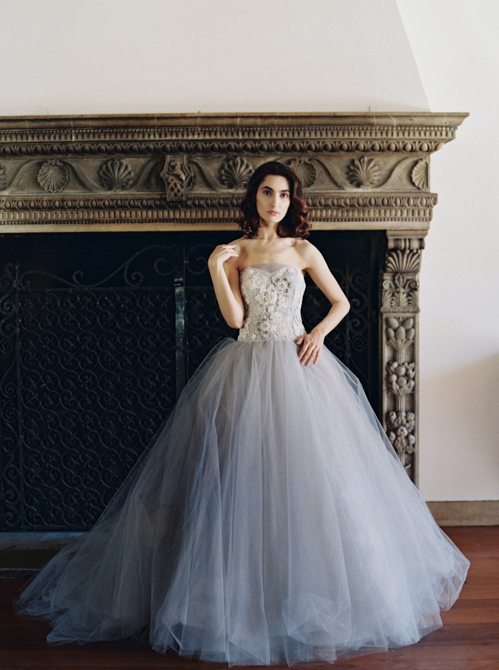 Bride in grey tulle wedding gown with lace bodice