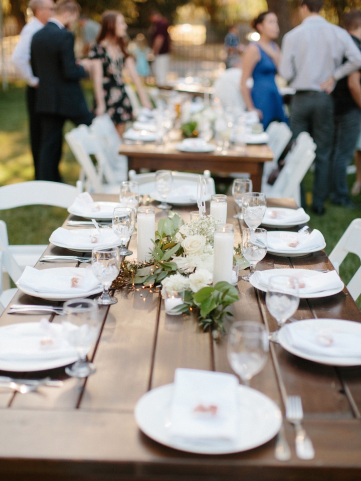 white and organic farm table style wedding seating