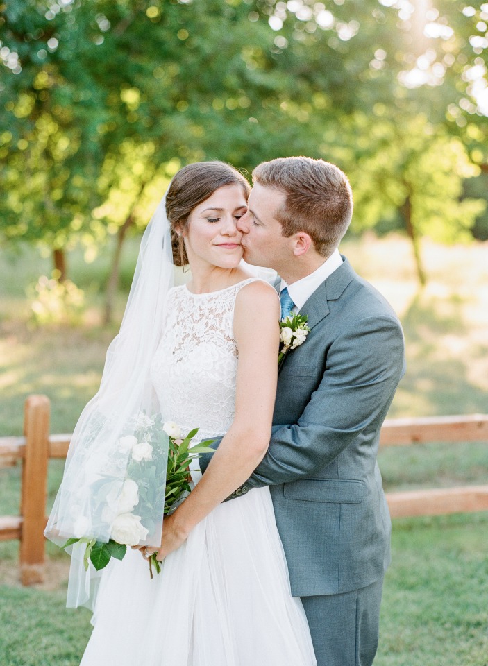 Happy couple sharing a sweet moment during their wedding day