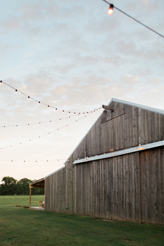 Rustic barn venue with bistro lights