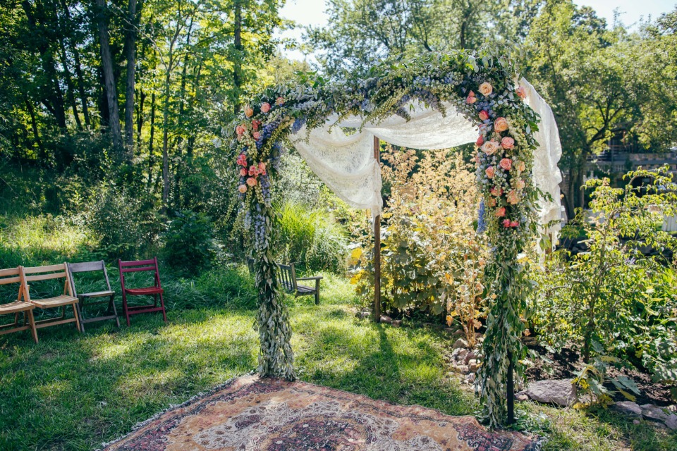 Rose floral ceremony arch