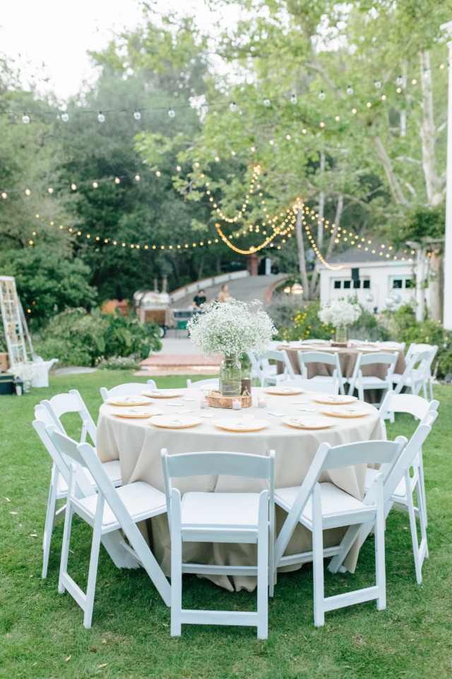 rustic wedding reception with bistro cafe lights
