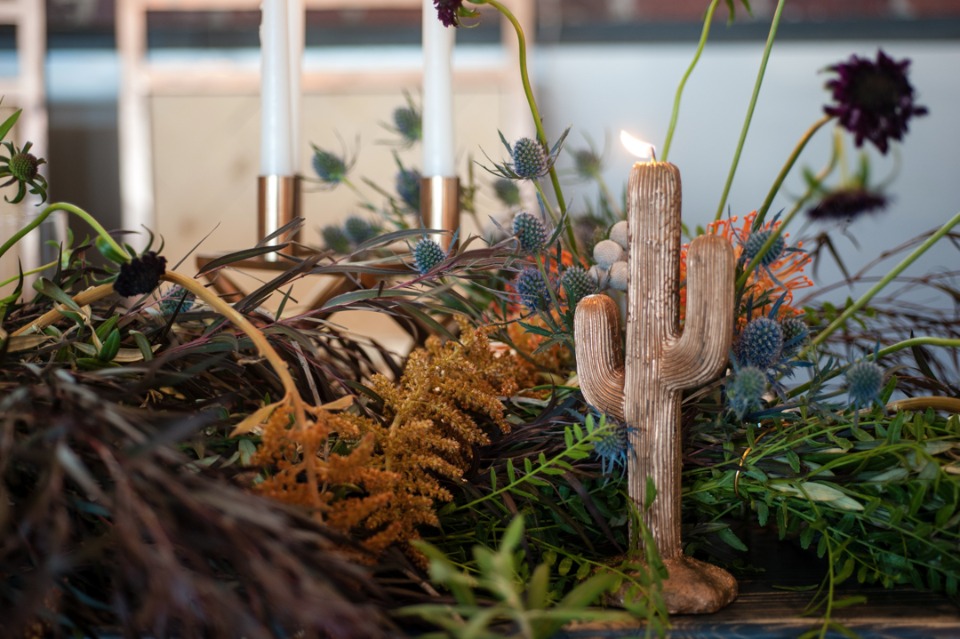 Desert floral centerpiece with cacti candle