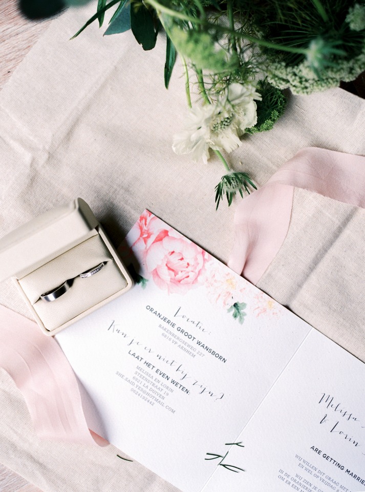flower accented wedding invitation