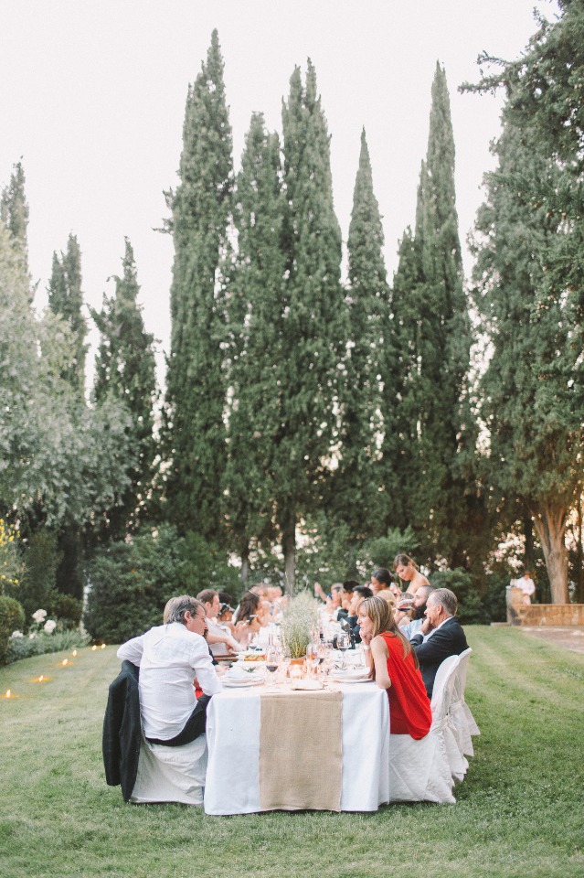 Outdoor dinner party with friends in a beautiful garden