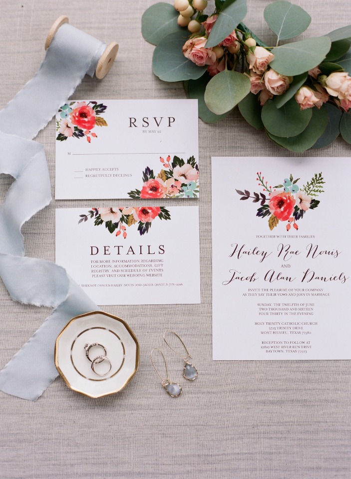 Elegant wedding invitation suite with floral accents