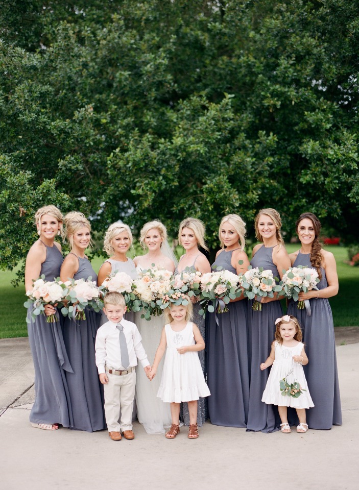 bridesmaids in floor length charcoal gray dresses