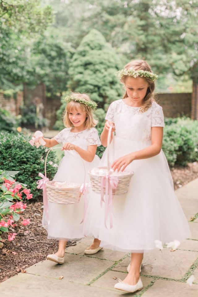sweet flower girls in matching dresses and flower halos
