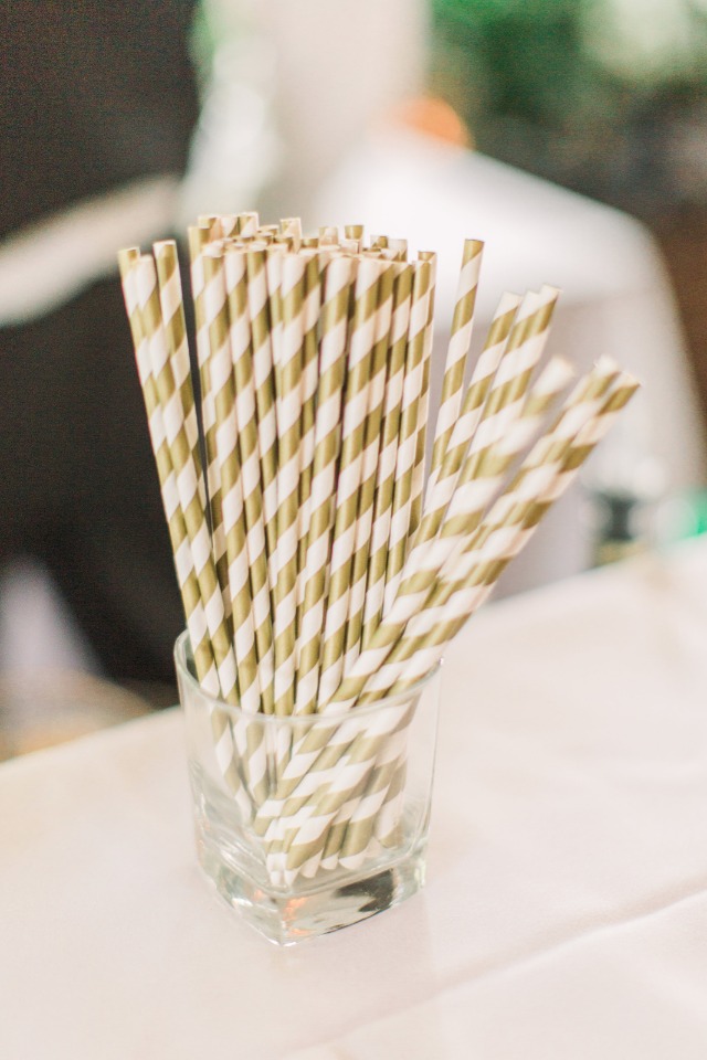 gold and white striped wedding straws