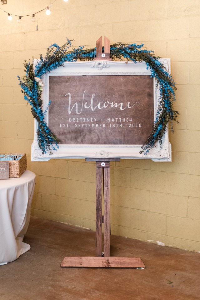 garland accented welcome sign