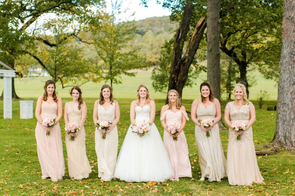 Bridesmaids in mismatched gowns
