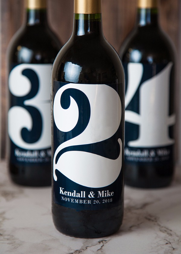 wine bottles with table numbers