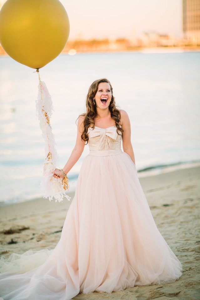 Vera Wang wedding dress and fun giant wedding balloon