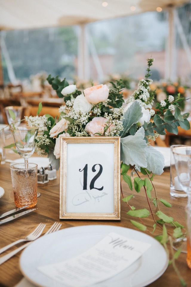 We love gold framed table numbers