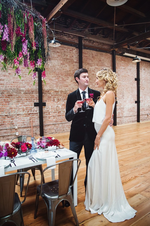 bride and groom at their industrial fall reception