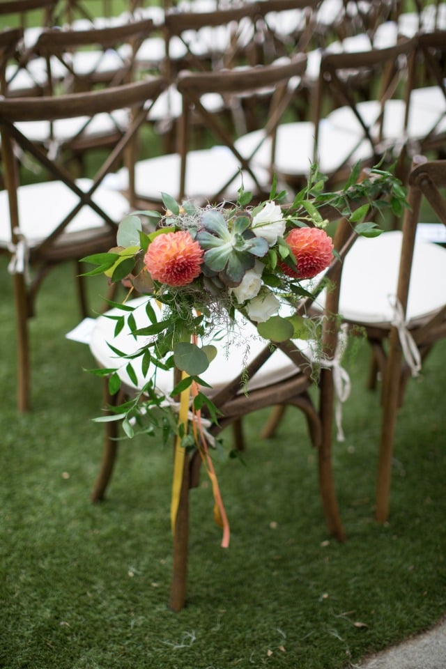 flower accented wedding chairs