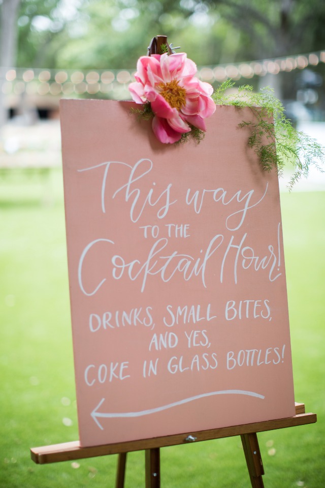 this way to the cocktail hour wedding sign