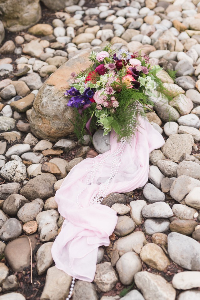wedding bouquet with cascading pink sash
