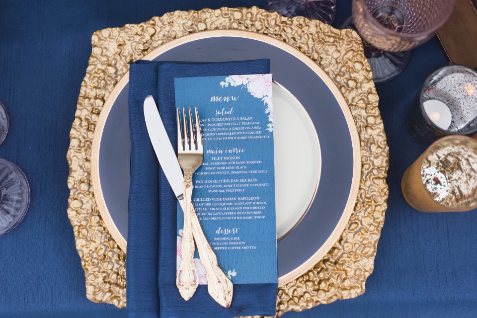 blue and gold place setting