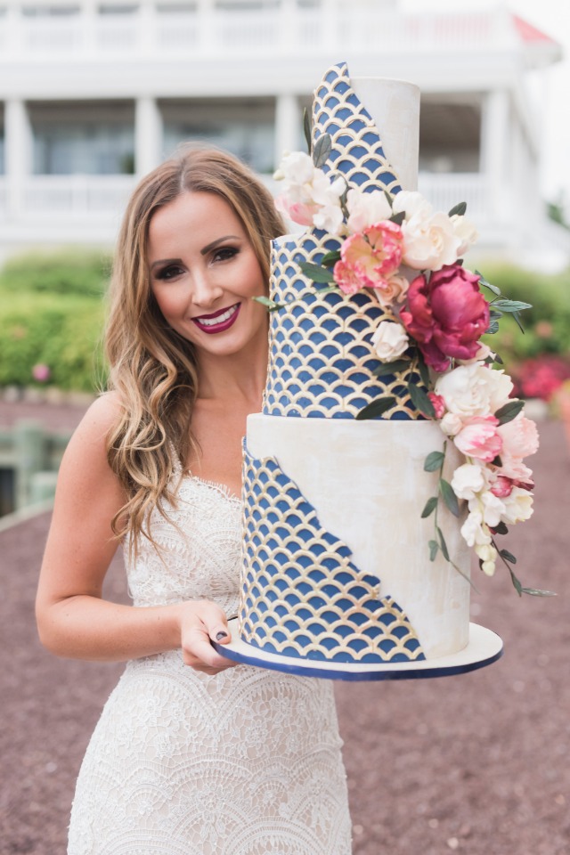 nautical themed blue and gold wedding cake