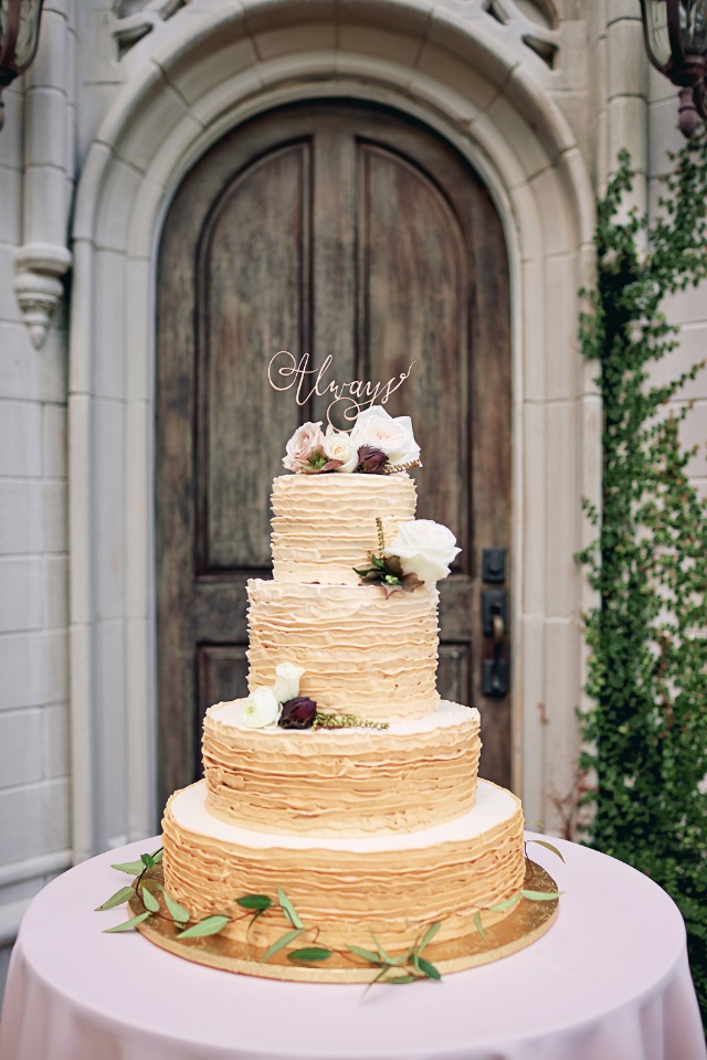 Gold ruffle wedding cake with florals