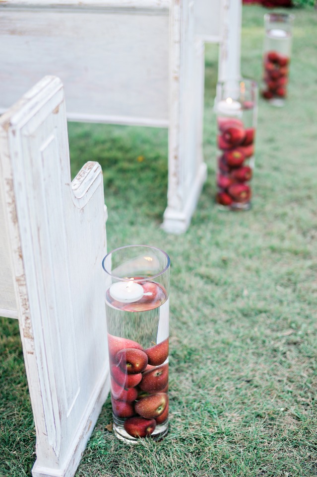 floating candles and apple aisle decor