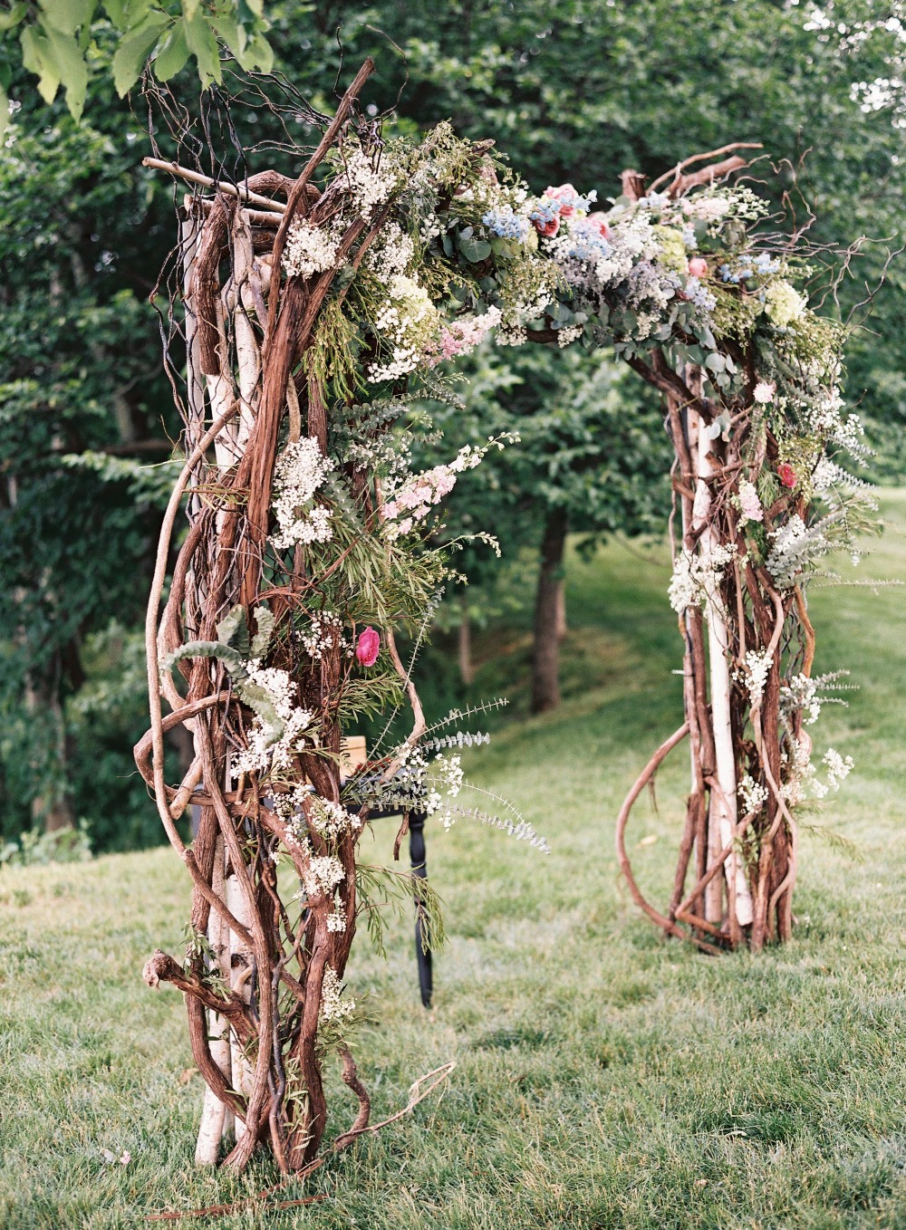 Floral and branches wedding arch