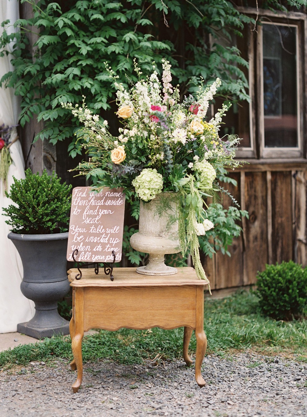 Giant florals and wedding sign