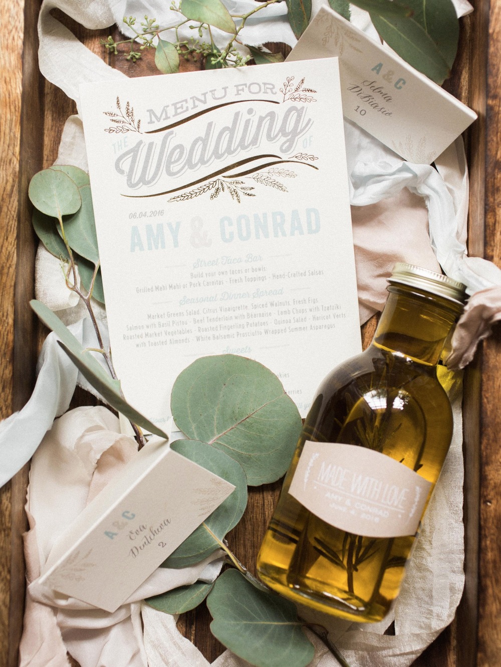 Wedding invite and olive oil wedding favor
