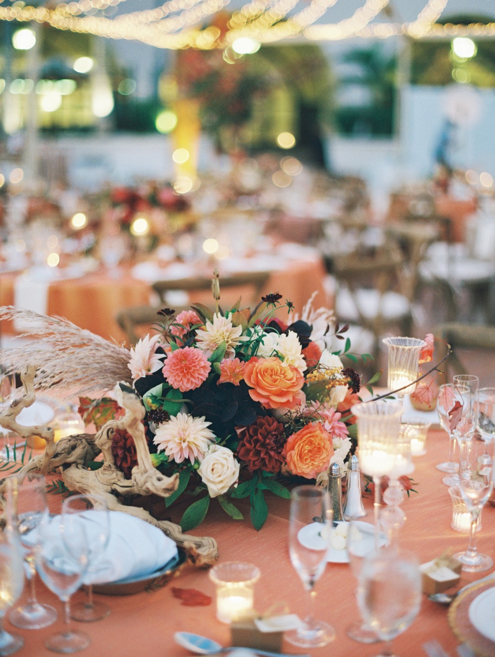 Elegant wedding table setting with floral centerpiece