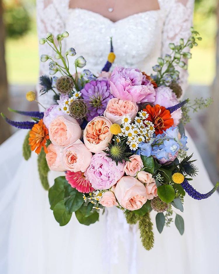 Wildflower wedding bouquet captured by an Arkansas, Missouri, Oklahoma wedding photographer