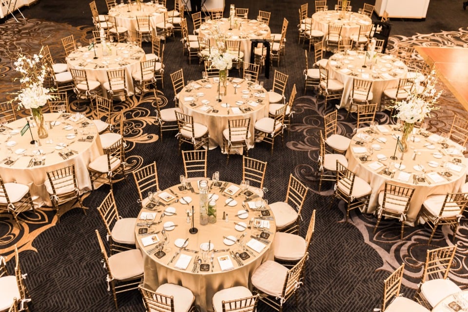 gold and white reception seating