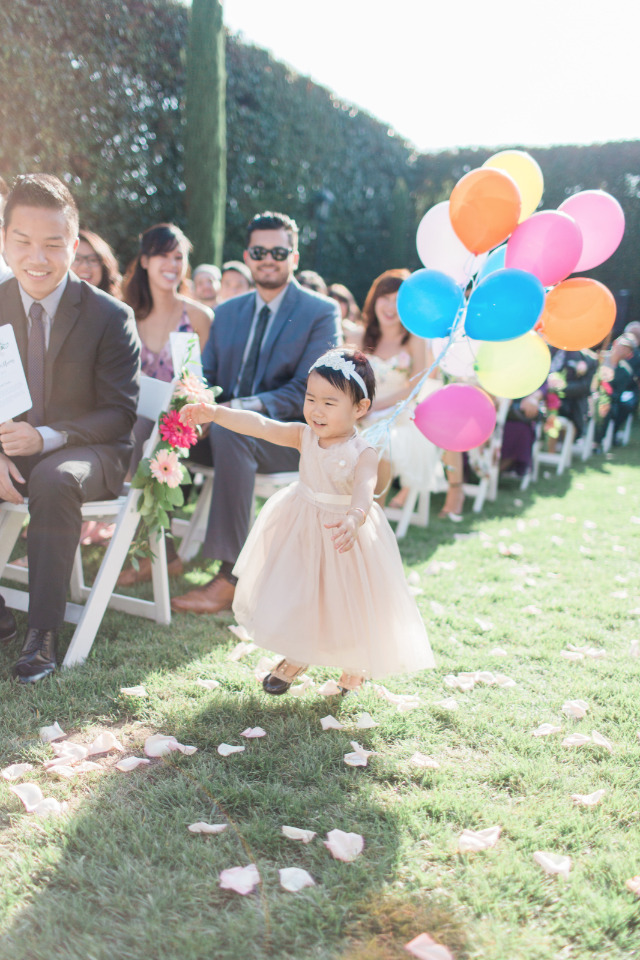 flower girl with balloons instead