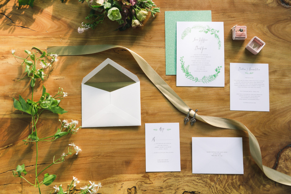 green and white wedding stationery