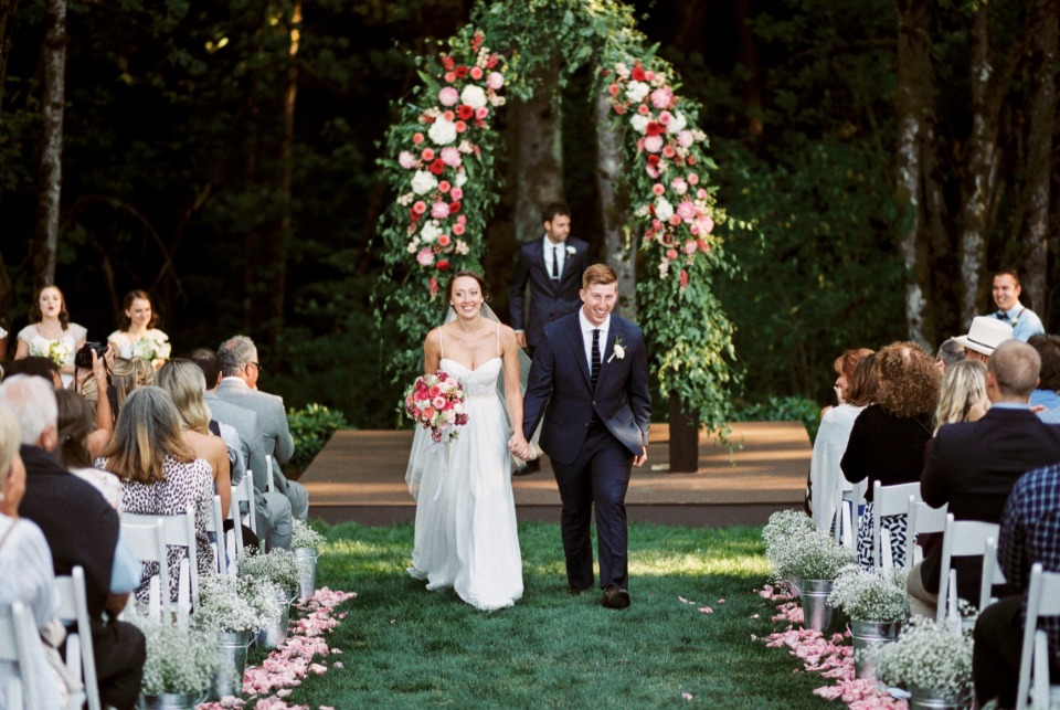 Look at that stunning wedding arbor!