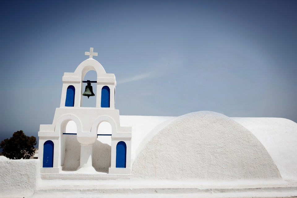 classic white and blue chapel in Greece