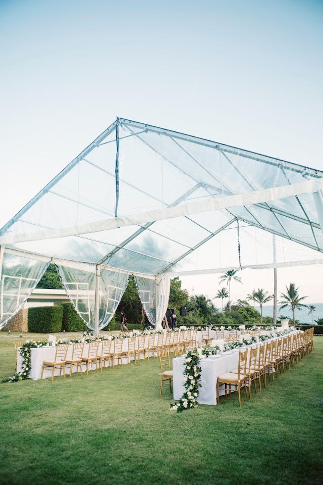 outdoor wedding reception under a clear tent