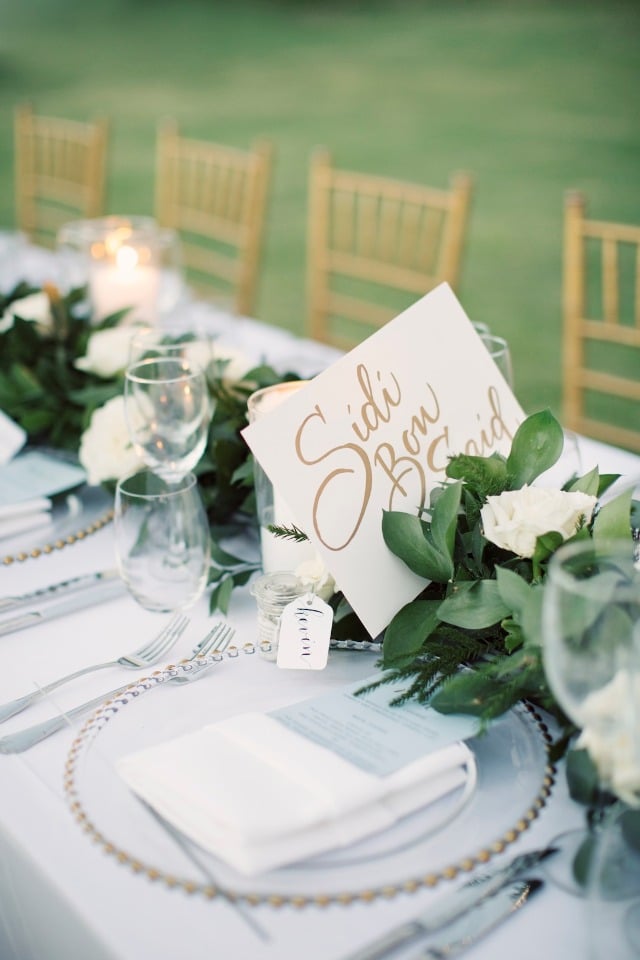 gold and white wedding reception table decor