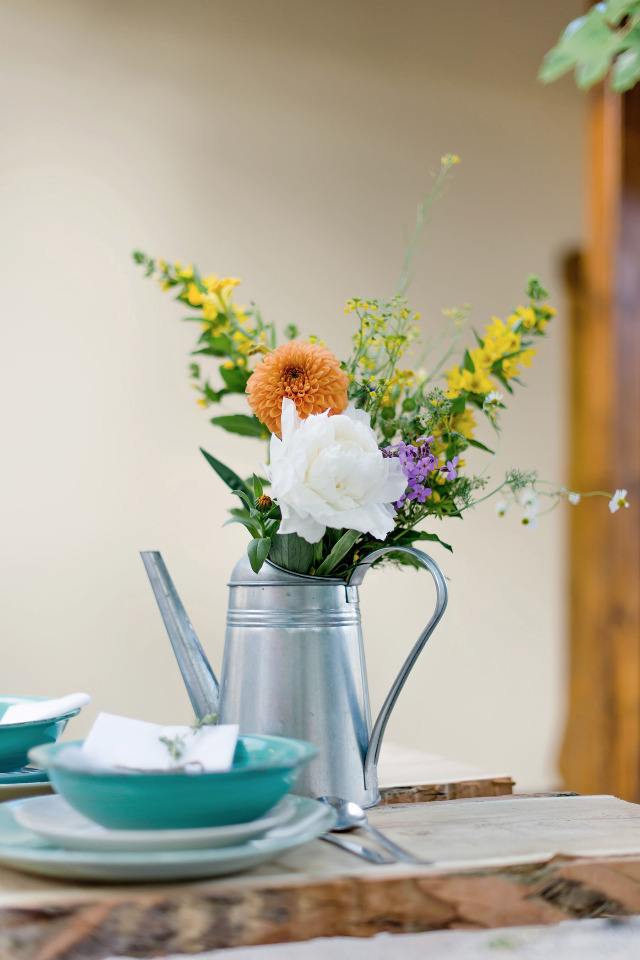 watering can floral centerpiece