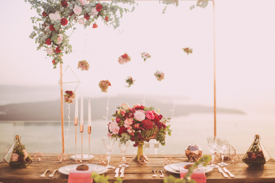 Elegant outdoor wedding table setting with flowers