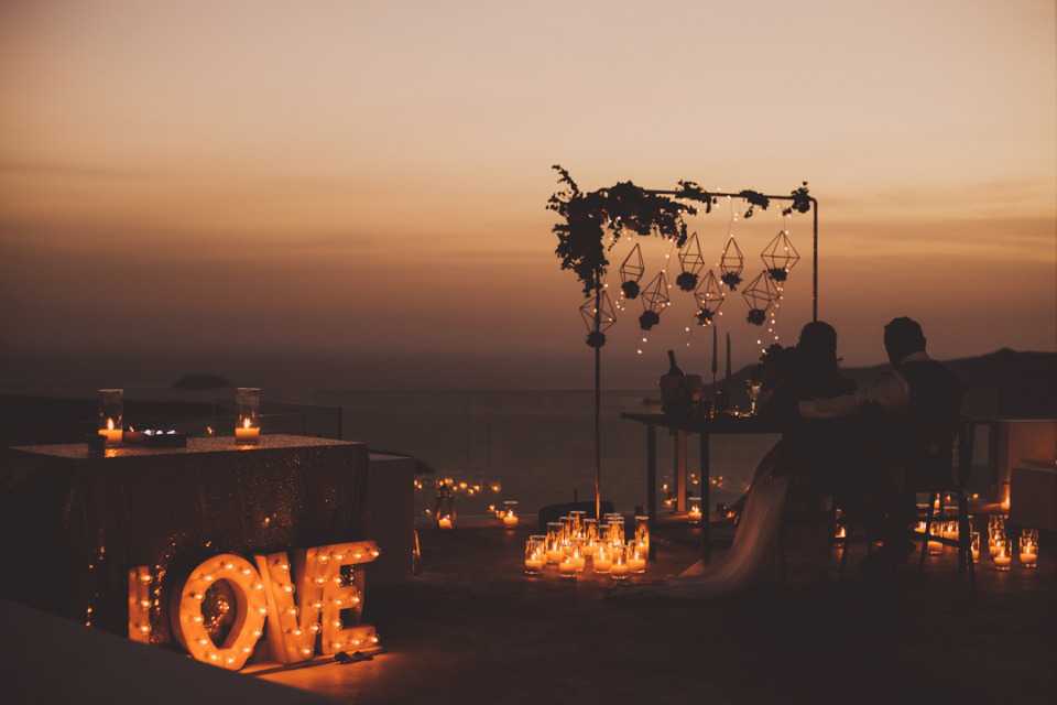 Romantic sunset dinner for couple with candle light