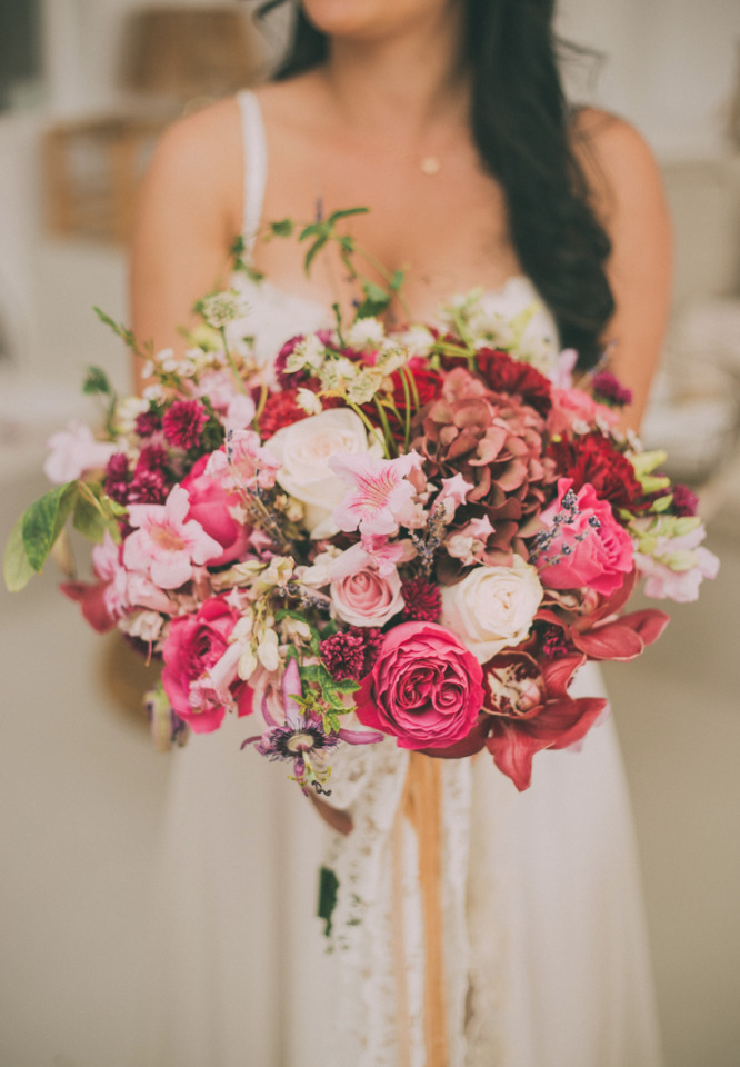 wild pink and red wedding bouquet