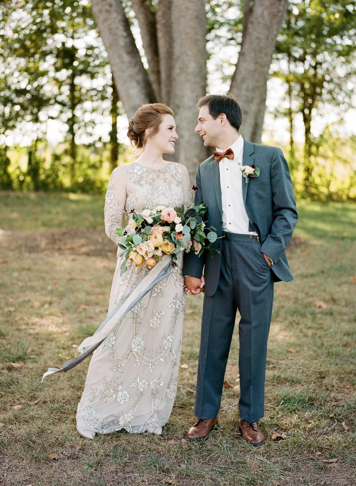 vintage style wedding dress and groom in bow tie and suit