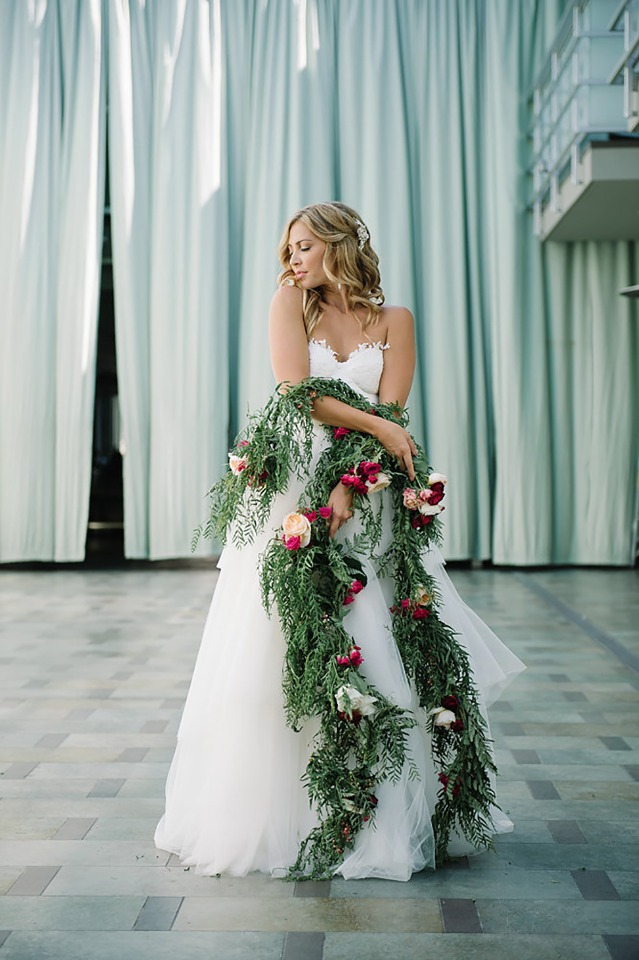 bride and a christmas garland