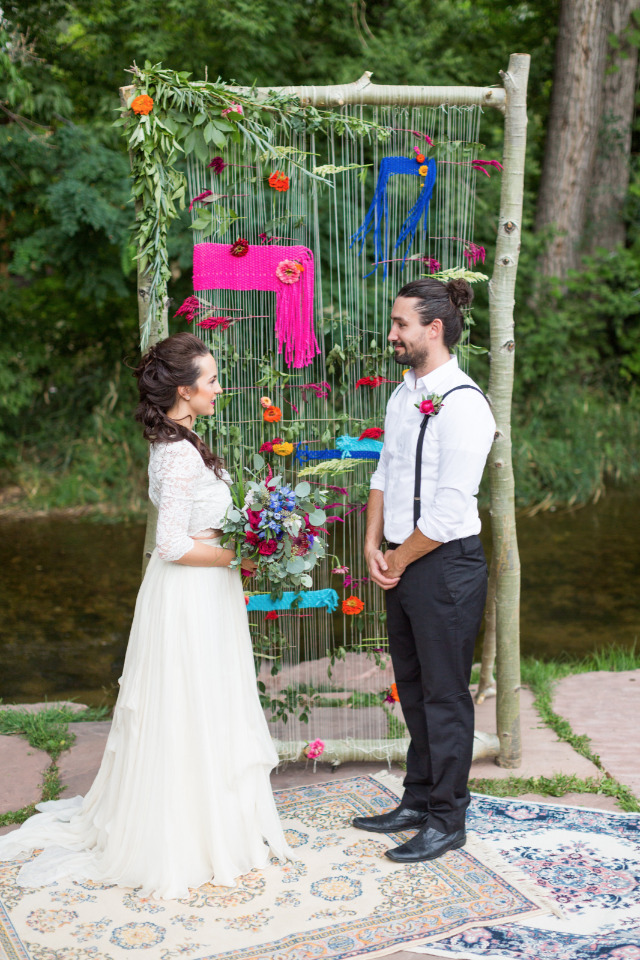 eclectic boho floral wedding ceremony backdrop idea